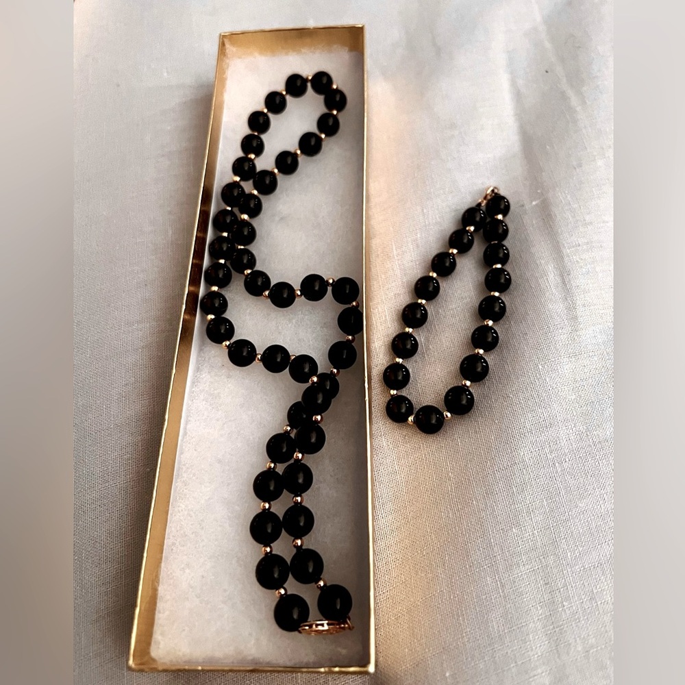 Black onyx  and 14k  gold beads set off 2 necklace and bracelet